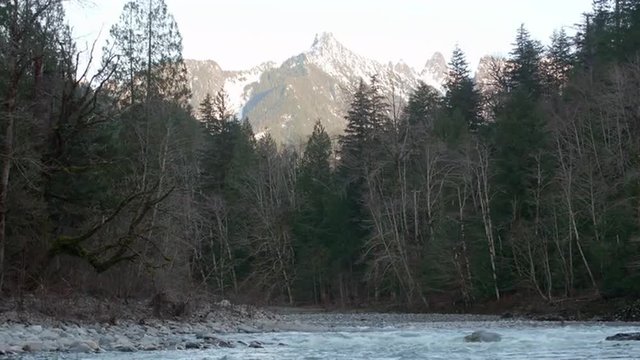 Skykomish River in Index Washington by Highway 2 with Snow Covered Mountain