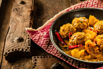 Traditional Tajine Dish of Yellow Curry Meatballs