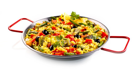 Vegetables and yellow rice in pan