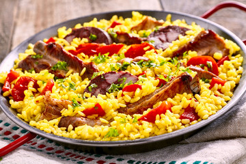 Serving of speciality Spanish Al Homo paella