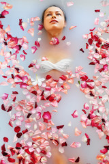 Spa Relax In Flower Bath. Woman Health And Beauty. Closeup Beautiful Sexy Girl Bathing With Rose...