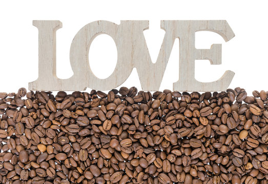 Fototapeta Coffee beans / Coffee beans and wooden letters with the word love