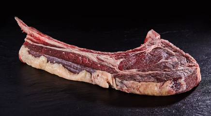 Fresh raw tomahawk beef steak or bone-in ribeye
