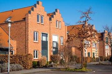 Fototapeta na wymiar New houses with red bricks near Berlin in Germany