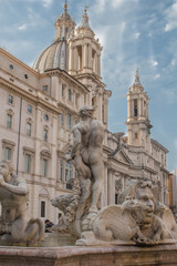 Fototapeta na wymiar Fountain of the Moor and Church Sant' Agnese in Agone Piazza Nav