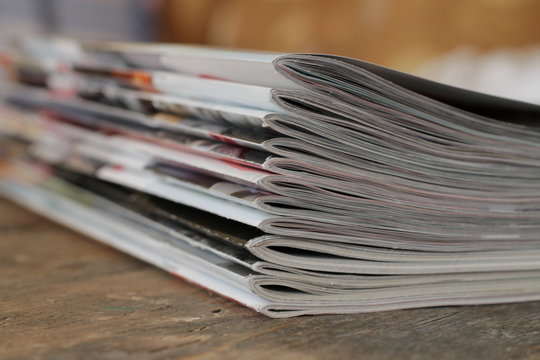 Magazines on the wooden table