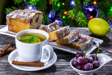 ginger tea with lemon and mint and cherry cake