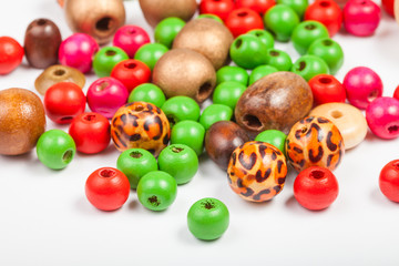 many painted wooden round beads