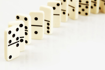 Dominoes standing in a row