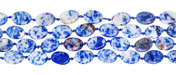 beads from blue lapis lazuli gem stone isolated