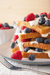 french toasts with creme fraiche and berries for breakfast