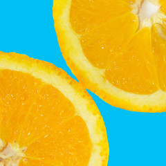orange slices isolated on the blue square