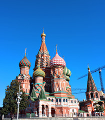 Fototapeta na wymiar Cathedral of Basil Blessed in Moscow against the blue sky