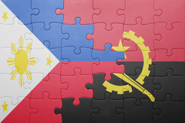 puzzle with the national flag of angola and philippines
