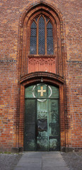 Fototapeta na wymiar Entrance to Church St. Nicolas of Spandau. XVI century. Berlin. Germany.