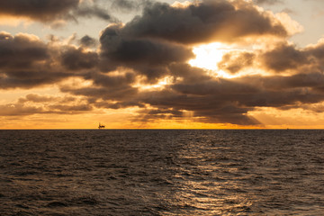 Oil platform at sunset