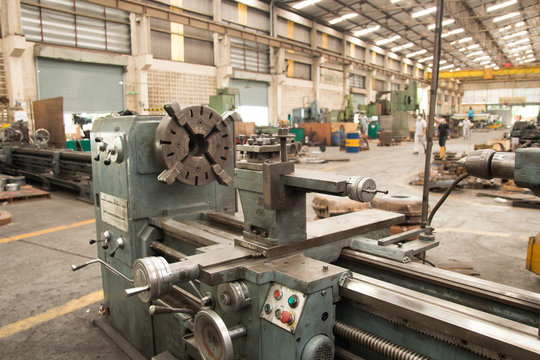 Center metal lathe machine in turnery workshop