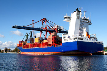 Unloading of a container ship in a container terminal in the Port of Gdansk