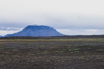 Dramatic icelandic landscape with a view on volcanic landscape on the road to volcano mountain Herdubreid