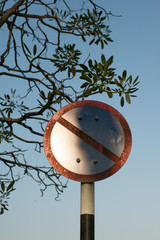 No entry for vehicles traffic sign against blue sky