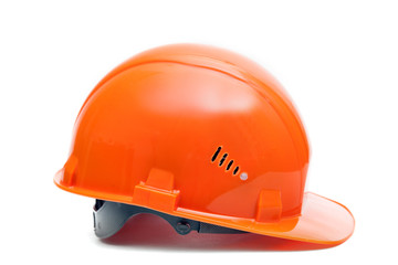 Fototapeta premium Orange hardhat isolated on white background