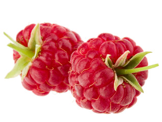 ripe raspberries isolated on white background close up