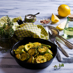 Fried zucchini with lemon zest