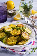 Fototapeta na wymiar Fried zucchini with lemon zest