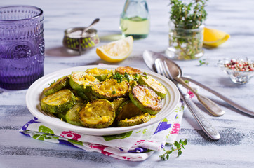 Fried zucchini with lemon zest