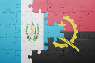 puzzle with the national flag of angola and guatemala