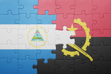 puzzle with the national flag of angola and nicaragua