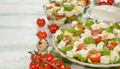 Vegetarian salad with cherry tomatoes, eggs and cheese