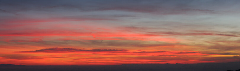 Fiery sunset from mountain pick