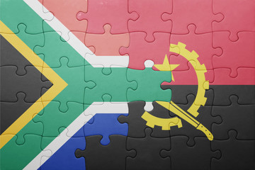 puzzle with the national flag of angola and south africa