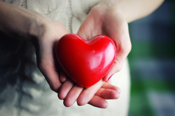 female hand valentine heart