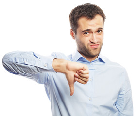 Disappointed young business man with thumb down.