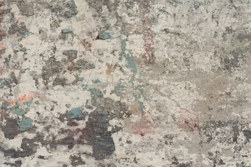 Fotobehang Verweerde muur Muurfragment met slijtage en scheuren