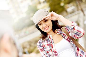 Man taking picture of girlfriend, week-end travel