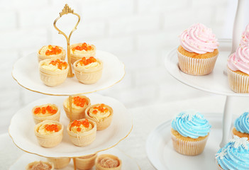 Set of cold snacks, canape and dessert, closeup
