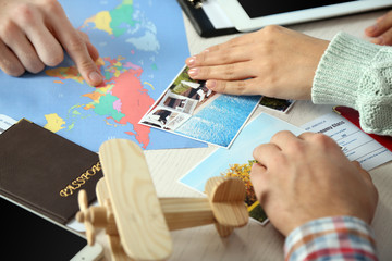 Offers vacation options in the office of travel company