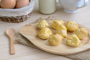 Choux pastry cream puffs with milk