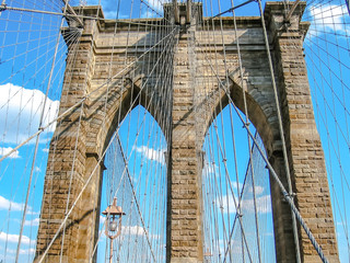 Close up of Brooklyn Bridge with all its characteristic metal wires, New York, United States.