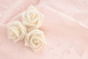 Wedding fabric background and roses