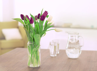 Bouquet of beautiful tulips on the table, close up