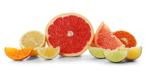 Colorful citrus slices of grapefruit, lemon, orange and lime isolated on a white background, close up