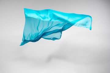 abstract teal fabric in motion