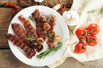 Grilled beef with vegetables on plate