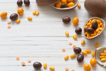 Chocolate Easter Eggs Over Wooden Background