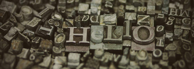 Close up of typeset letters with the word Hello