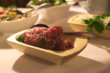 Raw ground pork shaped as a pig